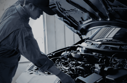 Professional car service in Hamilton with a mechanic inspecting the engine